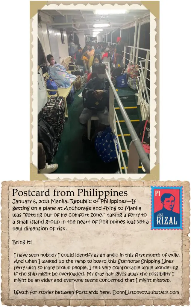 A postcard from philippines with an image of people on the back.