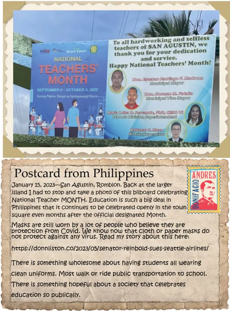 A postcard from philippines is posted on the side of a building.