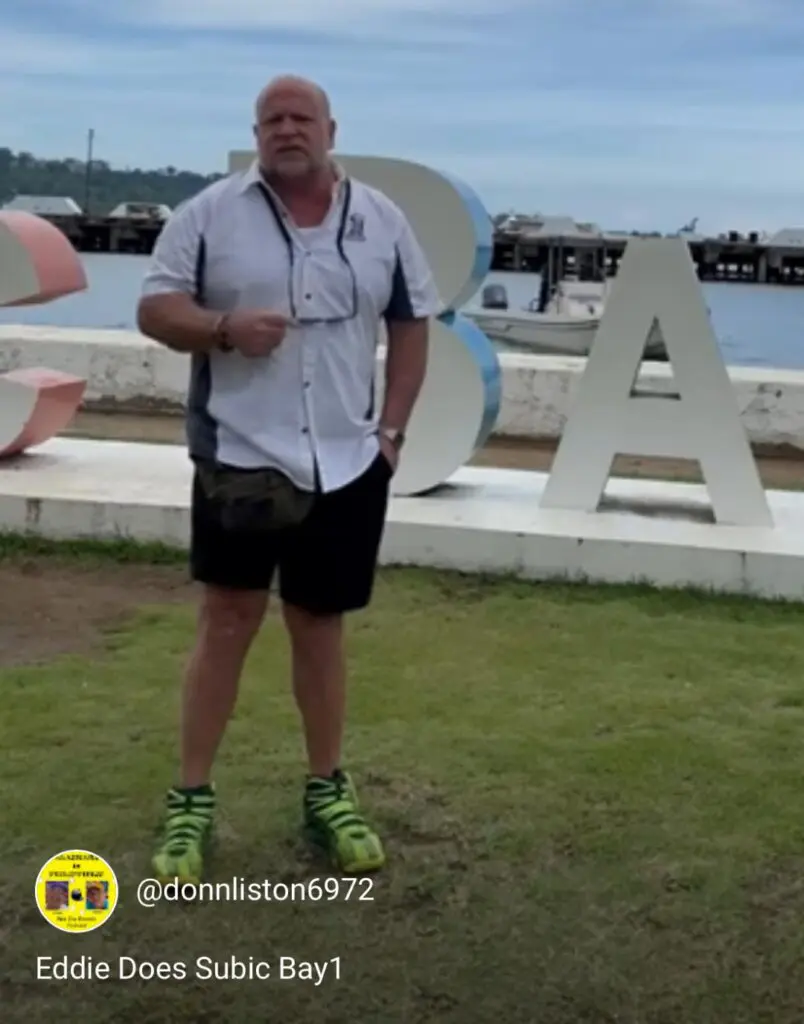 A man standing in front of the ocean.