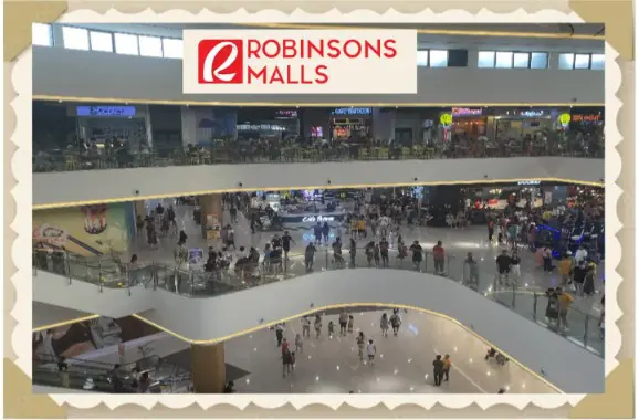 Crowded shopping mall with multiple levels.