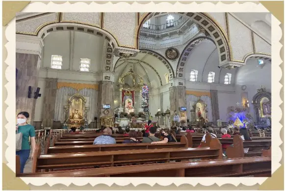 Indoor church scene with people seated.