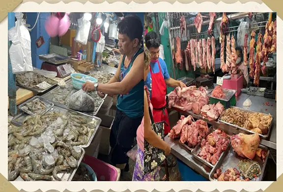 Market vendors selling seafood and meat products.