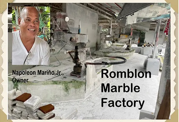 Smiling owner in marble factory setting.