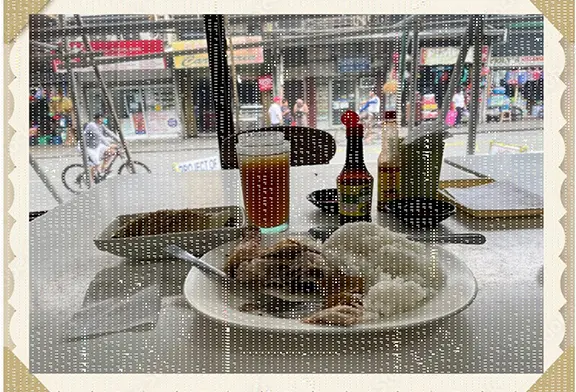 Plate of food with rice and drink.