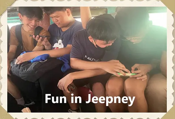 Group of boys enjoying fun in a jeepney.