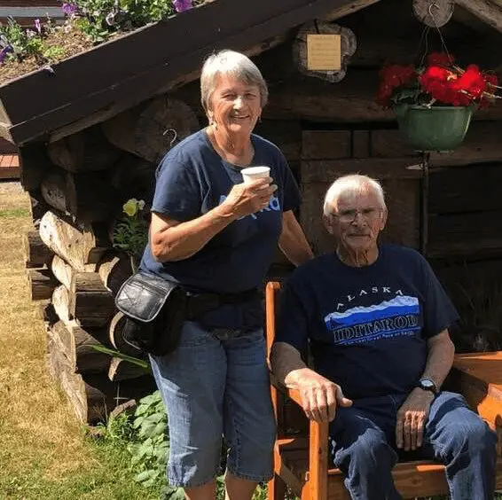 Smiling couple enjoying time together outdoors.