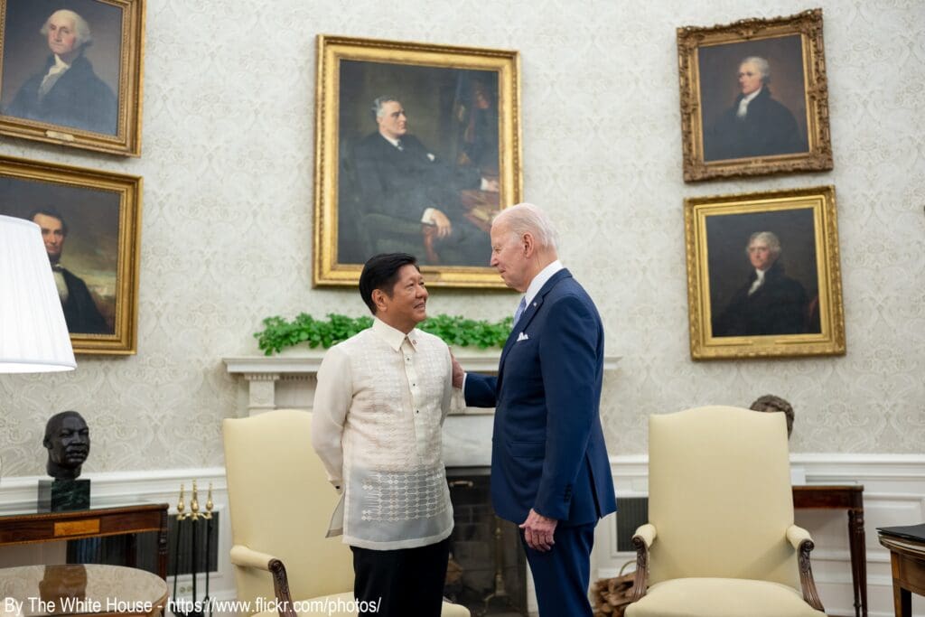 A man and woman standing next to each other.